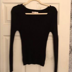 Small ribbed black blouse.